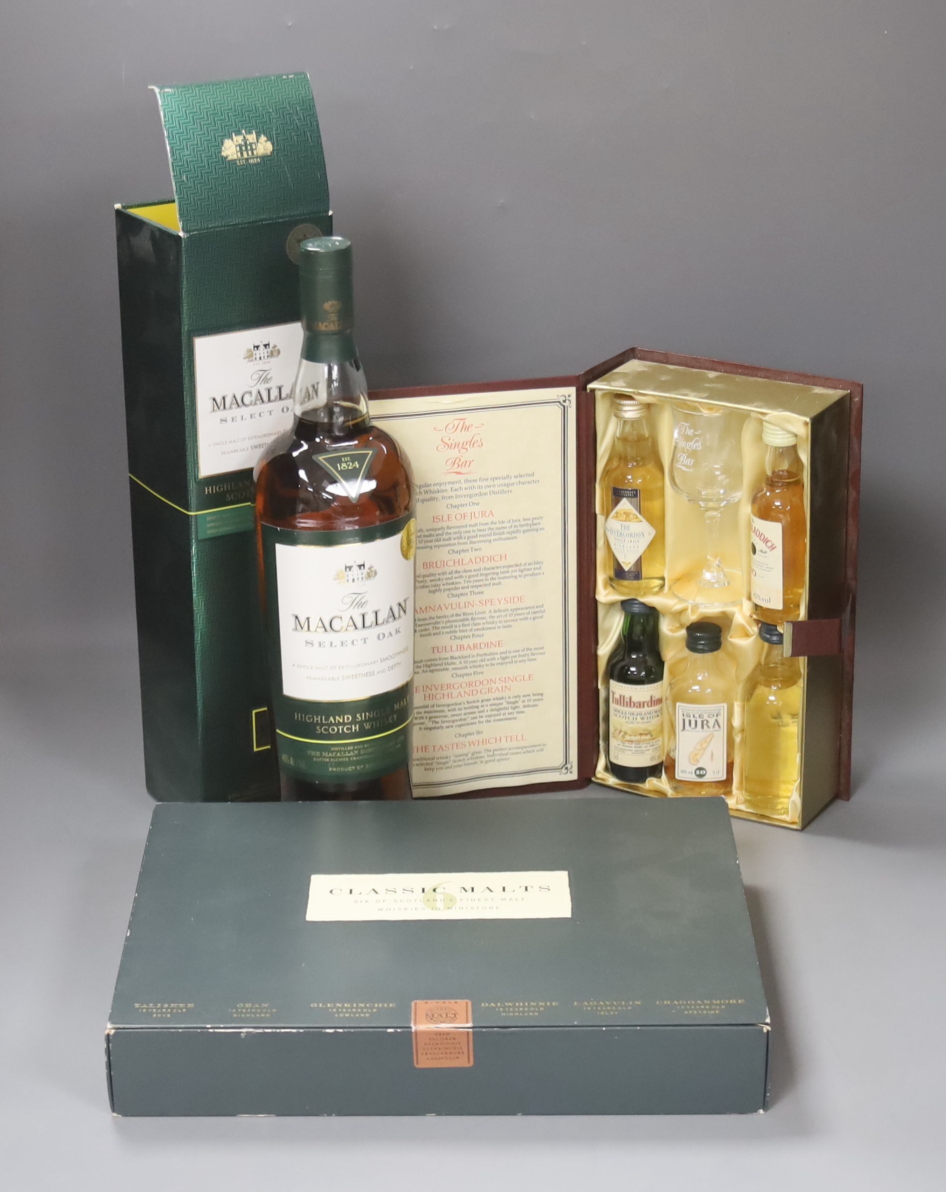 One bottle of Macallan select oak, a boxed Invergordon singles bar and similar classic malts